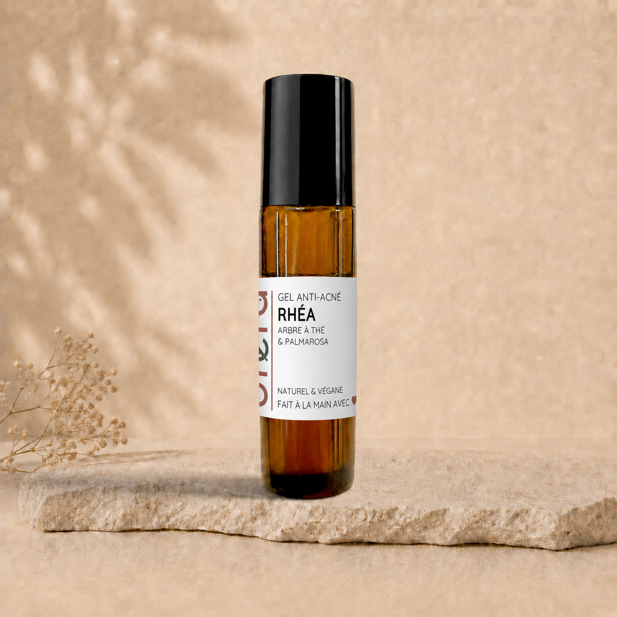 Roll-on anti-acné RHÉA arbre à thé et palmarosa, ORÉRA éco-luxe naturel, fabriqué au Québec, sans cruauté.