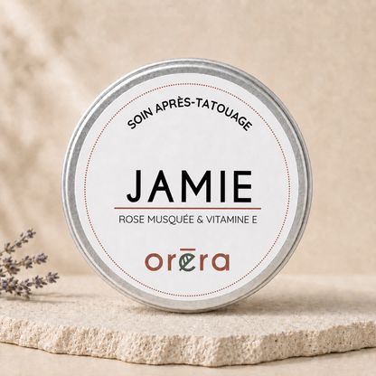 Baume à tatouage Jamie Oréra, éco-luxe naturel, rose musquée et vitamine E, fabriqué au Québec, sans cruauté.