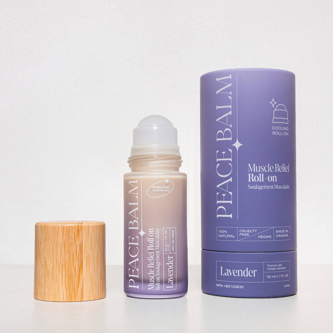 Baume Peace Balm lavande roll-on avec bouchon bois et étui violet éco-luxe naturel.