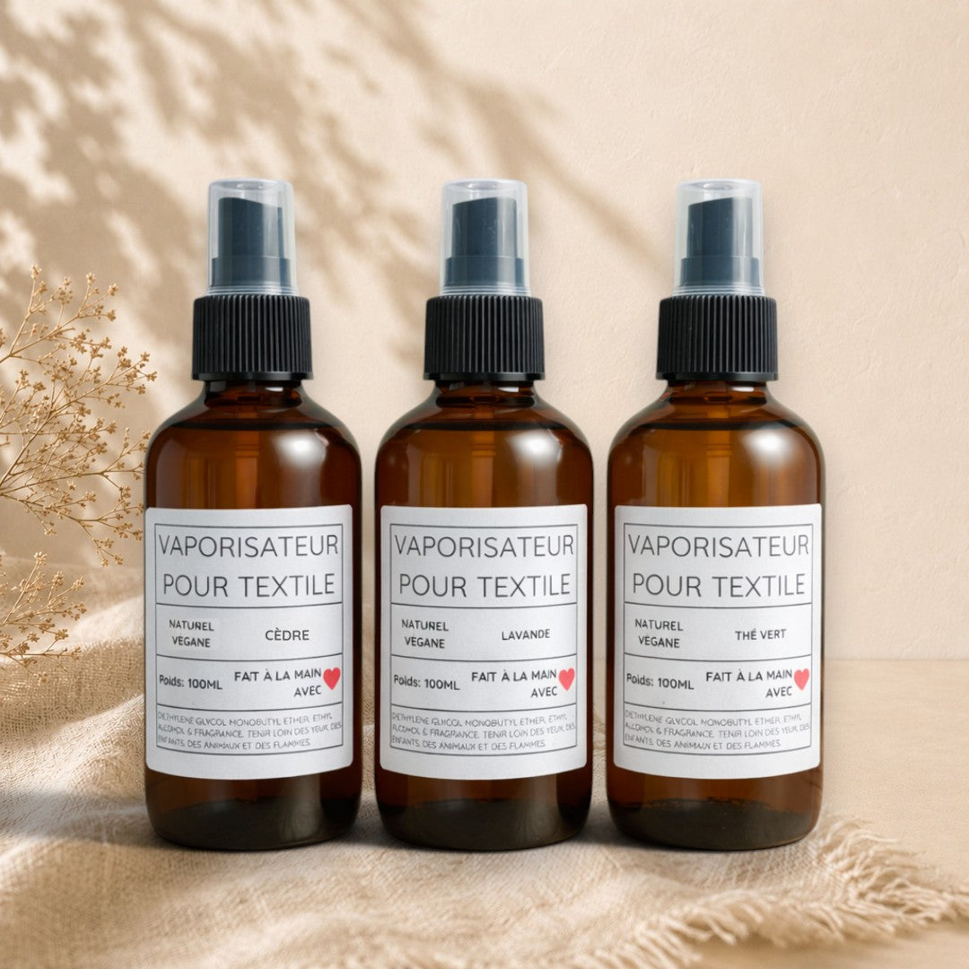 Vaporisateurs textile ORÉRA en verre ambré, éco-luxe naturel, soins artisanaux québécois sans cruauté.