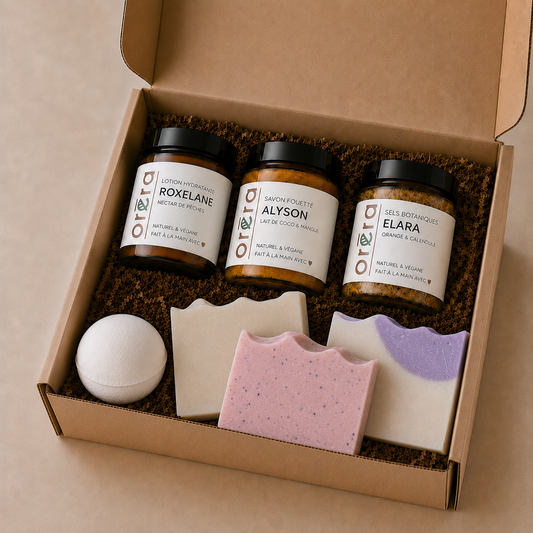 Boîte cadeau ORÉRA avec trois pots en verre ambré, deux savons naturels, une bombe de bain et une lotion hydratante